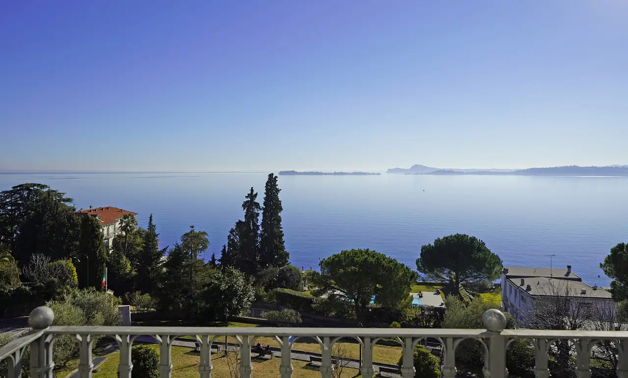 Lake view from balcony with wrought iron railing