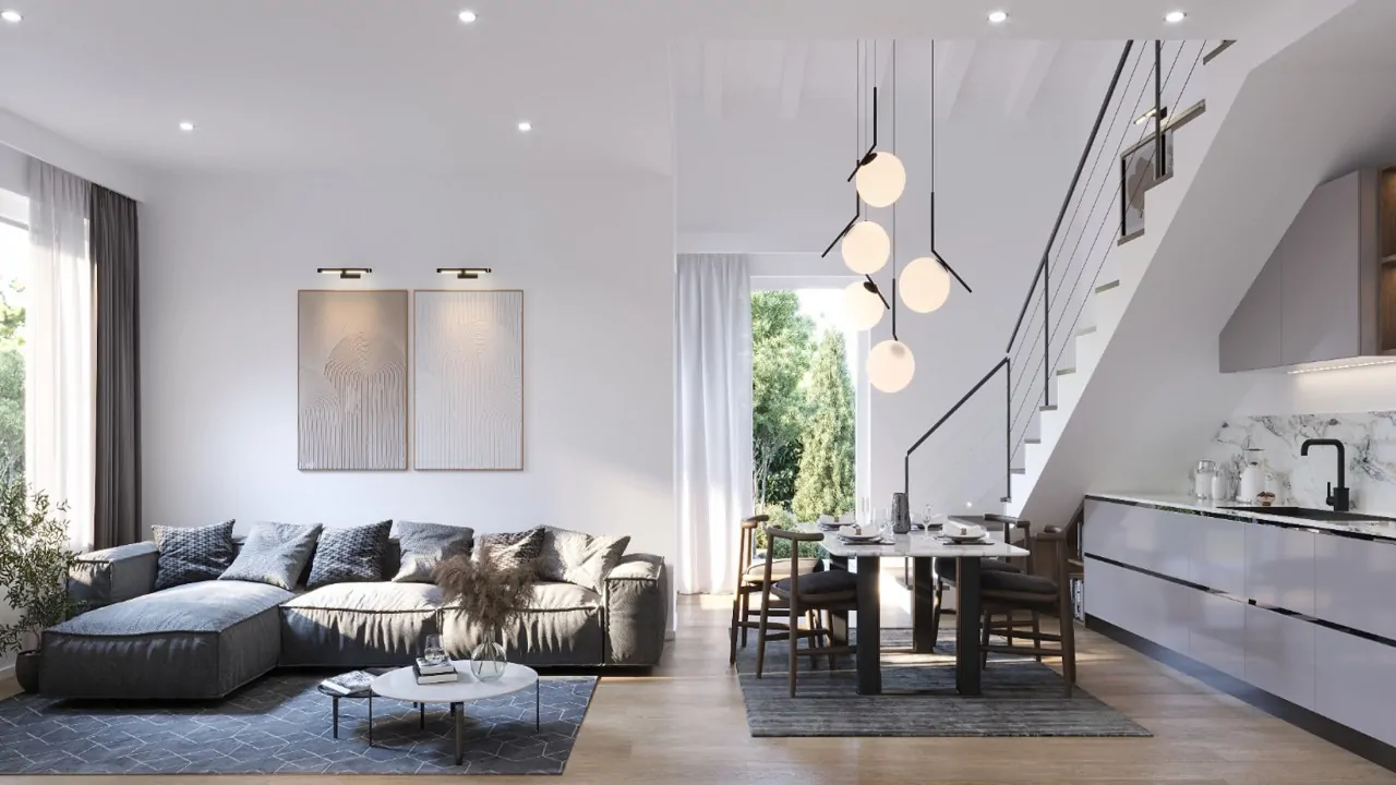 Wohnzimmer mit Ecksofa und Essbereich mit modernem Kronleuchter