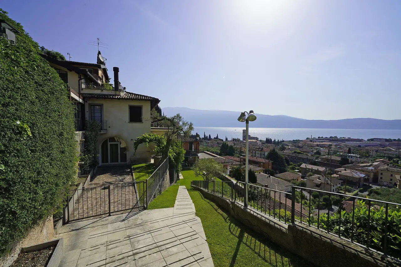 Entrance with path and lake view