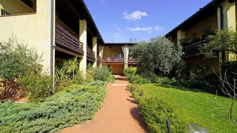 Elegant flat in residence with swimming pool surrounded by greenery in Soiano del Lag, Soiano del Lago