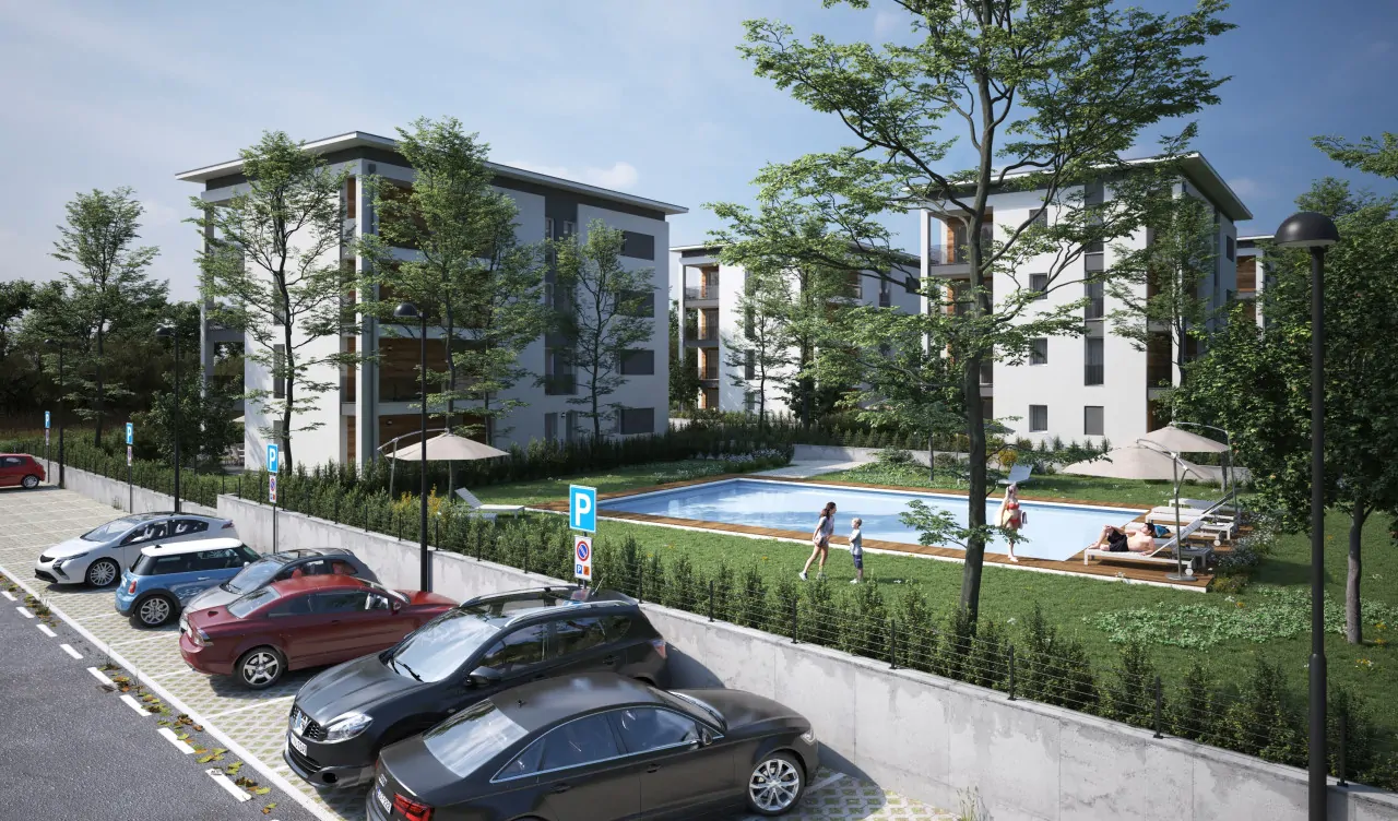 Wohnanlage mit Schwimmbad und Außenparkplatz